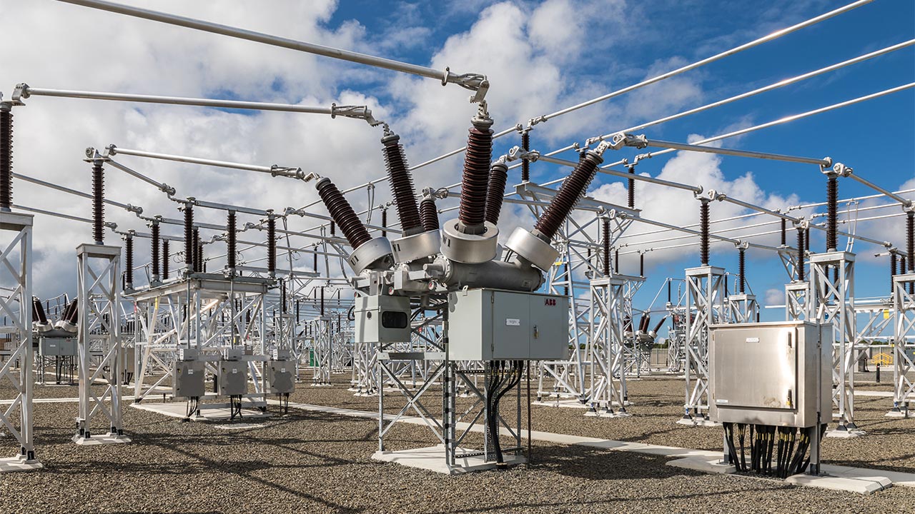 Electricity substation against a blue sky